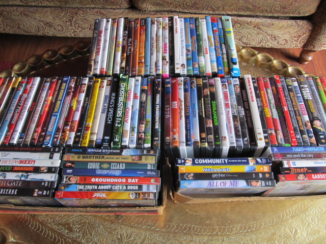 lot 74 image: Lot of 100 DVDs