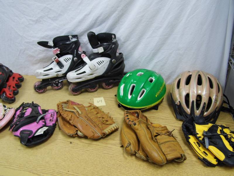 lot 64 image: Roller Blades - Baseball Gloves - Sports Items