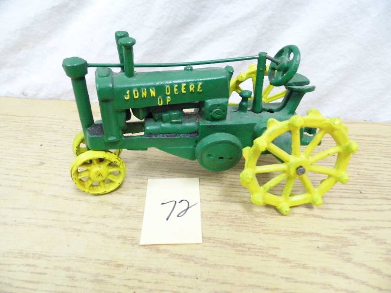 lot 72 image: John Deere Cast Iron Tractor