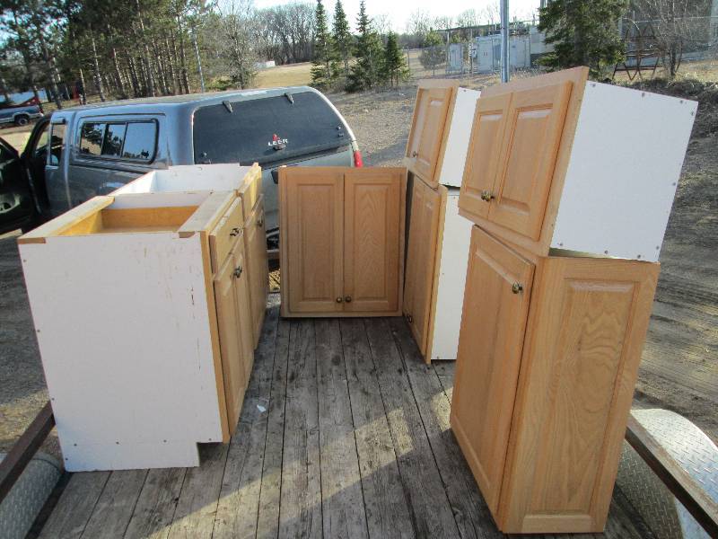 lot 13 image: Oak Raised Panel Cabinets