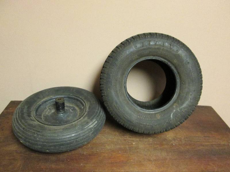 lot 86 image: Wheelbarrow Tire  Lawnmower Tire