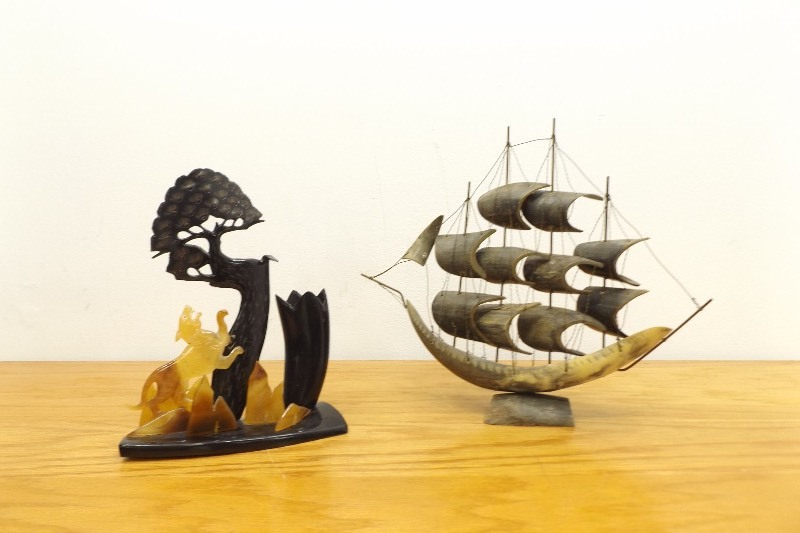 lot 24 image: 2 Buffalo Horn Sculptures