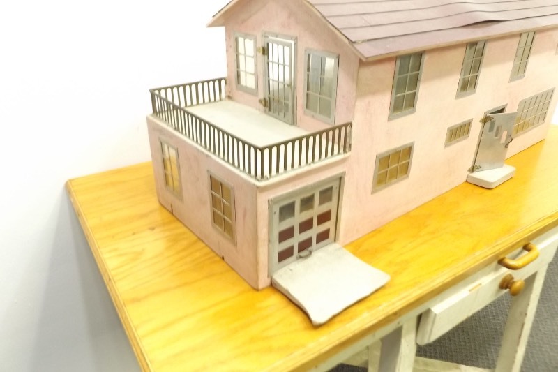 lot 32 image: Vintage SOLID Wood with Metal Trim Dollhouse