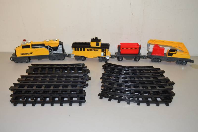 lot 193 image: Caterpillar Toy Train and Tracks