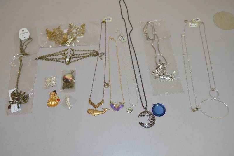 lot 297 image: Necklaces and Pin