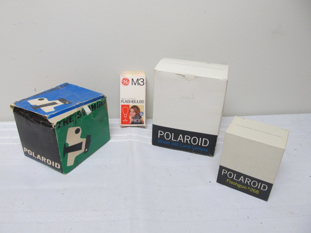 lot 65 image: 2 Vintage Polaroid Cameras wAccessories