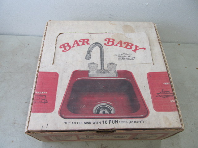 lot 71 image: NOS Vintage Yellow RVTrailer Sink