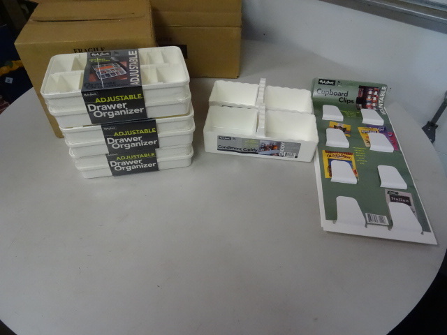 8 condiment caddys. 3 drawer organizers.  3 cupboard clips.
