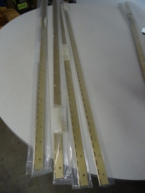 Metal hinges. 48. Brass finish. New