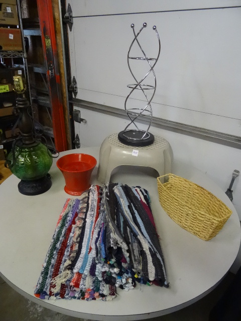 Vintage lamp. Candle. Step stool. Rugs. Wicker basket