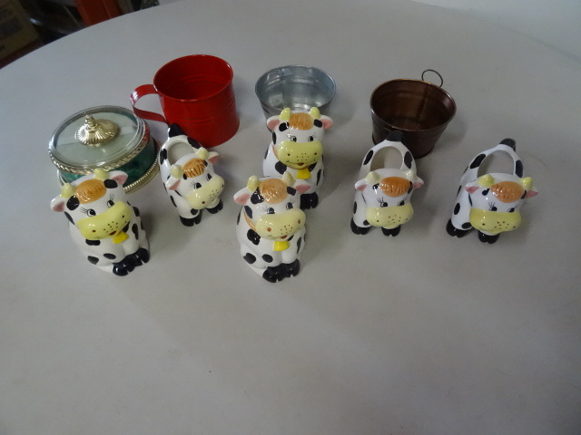 Metal buckets. 3 sets of cow sugar and creamers