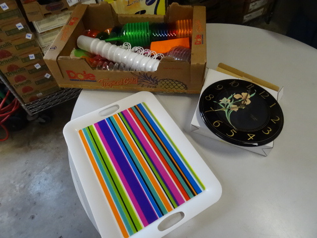 Plastic glasses. Wall clock. Plasti...