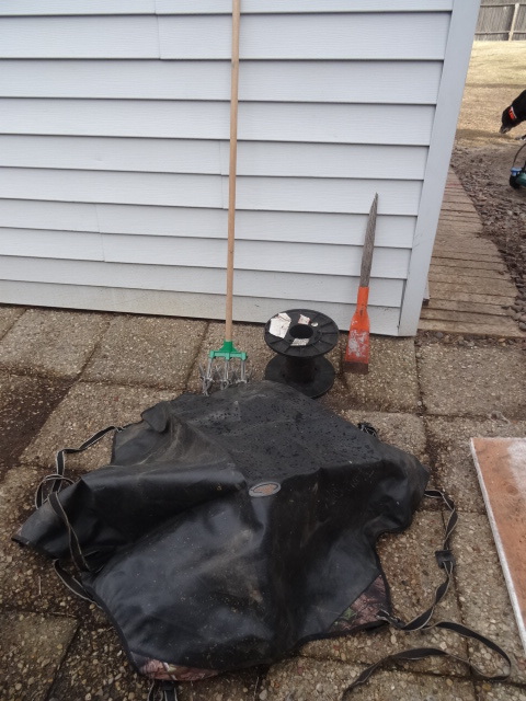 Garden weasel. Canvas cover for back of a 4 wheeler. Spool. Scraper with broken handle