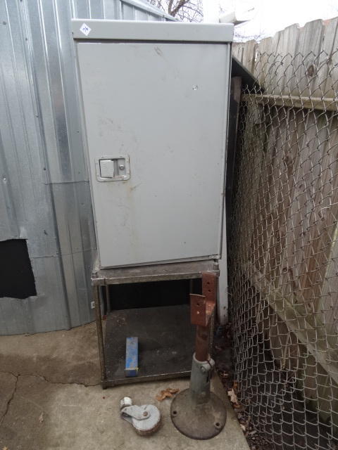 Metal truck storage box. 41 x 19 x 24. Metal stand. 24 x 24 x 29. Cast iron machine base