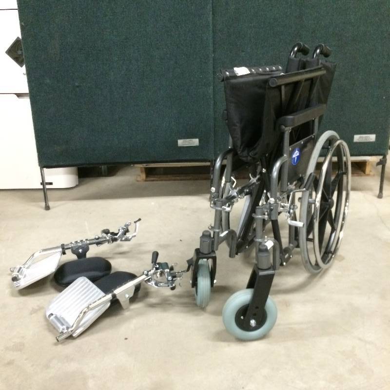 lot 1 image: WOW Walmart Retails $1200 - This Wheel Chair Is In Like New Condition  Medline Excel Shuttle Extra-Wide Bariatric Wheelchair 850lb Capacity Desk Arms Padded Legrests