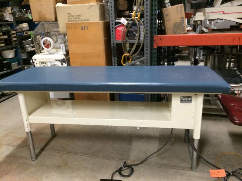 lot 74 image: WOW Tri W-G Hl 2F Motorized UpDown Treatment Hi Lo Mobile Physical Therapy Medical Table - Works Great Minor Tear To Upholstery at End.