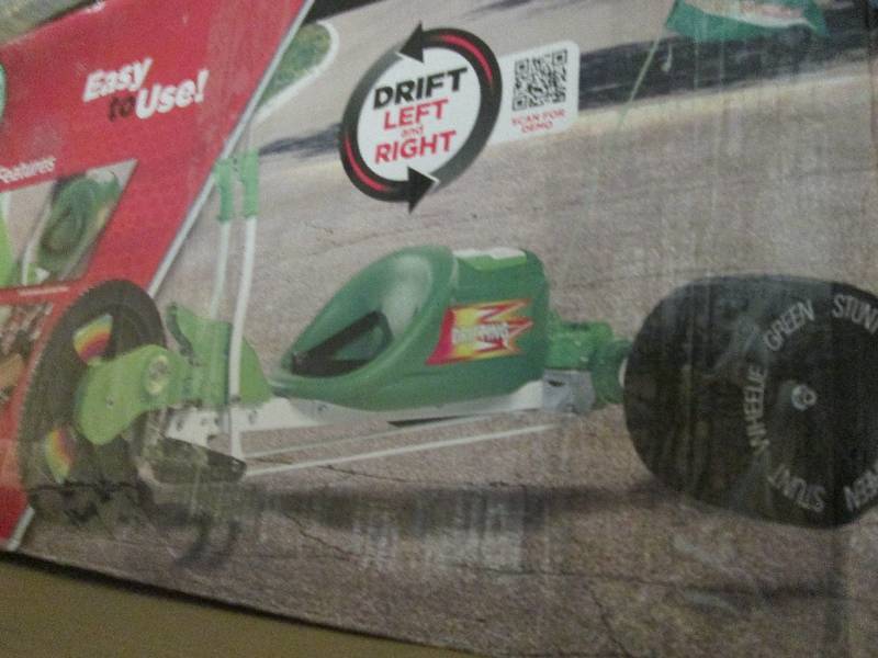 Green Stunt Wheelie open box Retail...