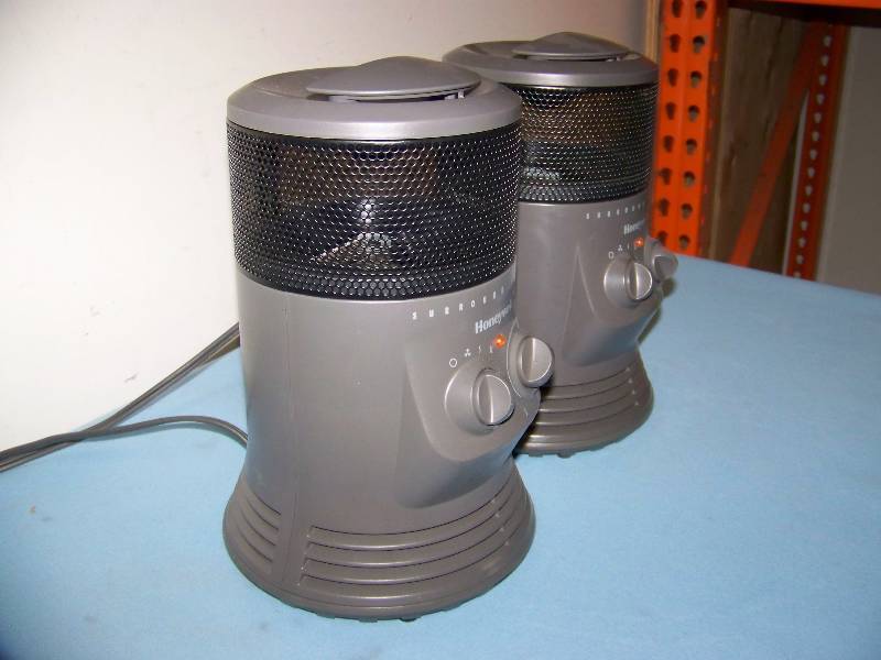 lot 148 image: (2) Honeywell (KAZ), Surround Heat, Oscillating, Room  Space Heaters
