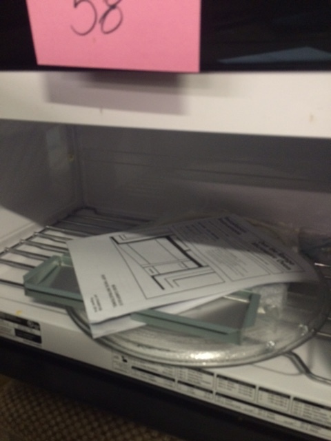 lot 58 image: Kenmore Microwave Hood Combination