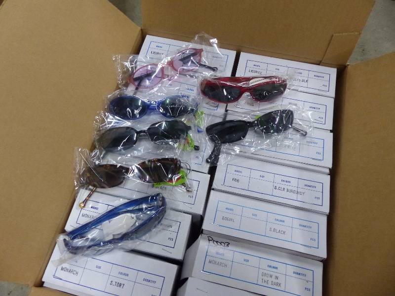 144 pairs of new sunglasses