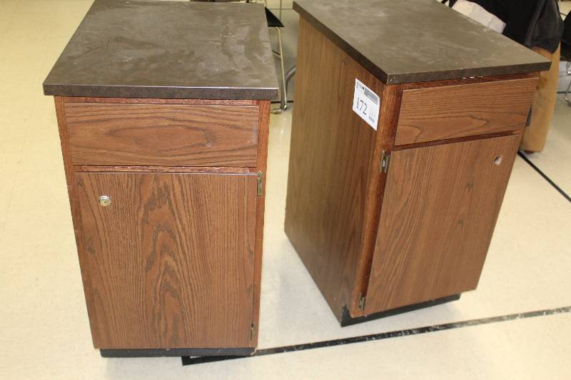 lot 172 image: Lot of (2) 1-Door w Pull-out Shelf 1-Drawer Locking Wood Wheeled Cabinets