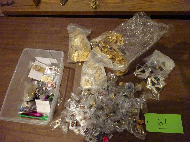 lot 61 image: Lot of Music Key Chains and Collector pins