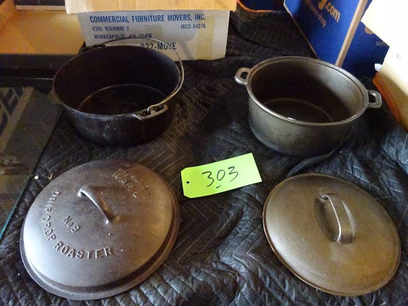 lot 303 image: Pair Cast Dutch Ovens