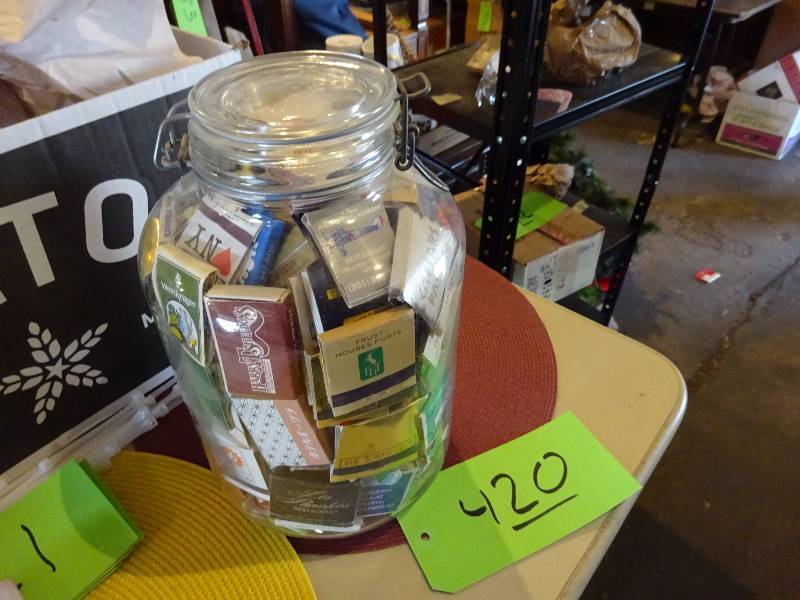 lot 420 image: Glass Jar of Match Books