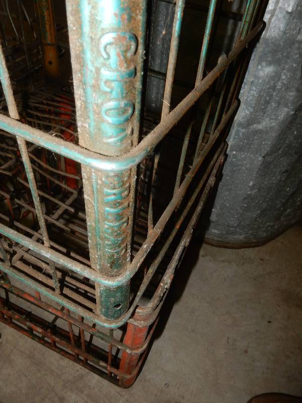 lot 28 image: 4 heavy Steel milk crates  Clover leaf