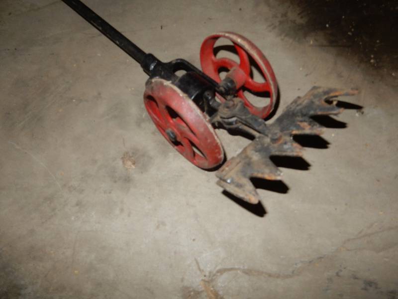 lot 24 image: Antique Sycle Mower with hand crank.