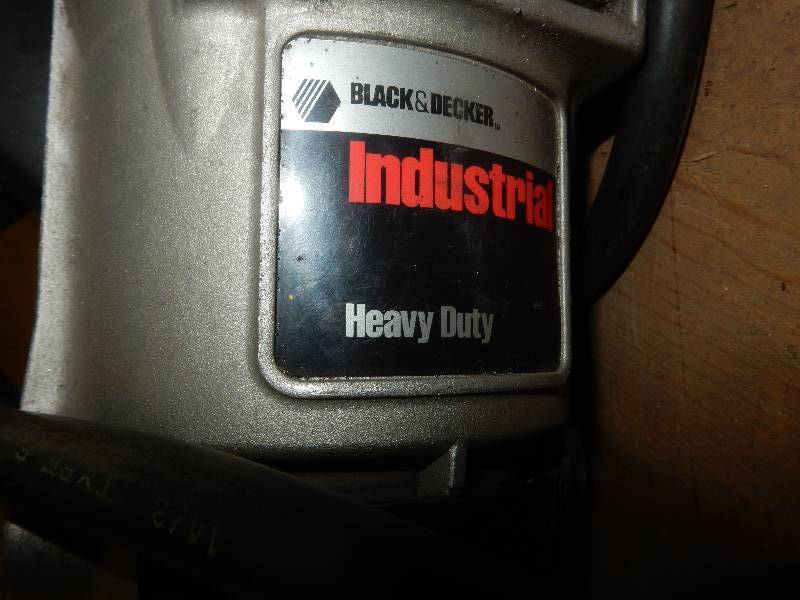 lot 58 image: Black and Decker Industrial 79 in Angle Grinder