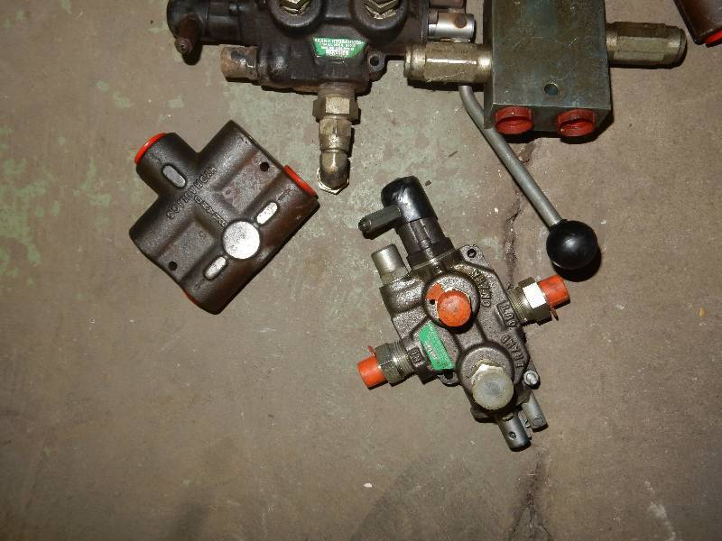 lot 99 image: Misc. Hydraulic Parts and Controls and a pump