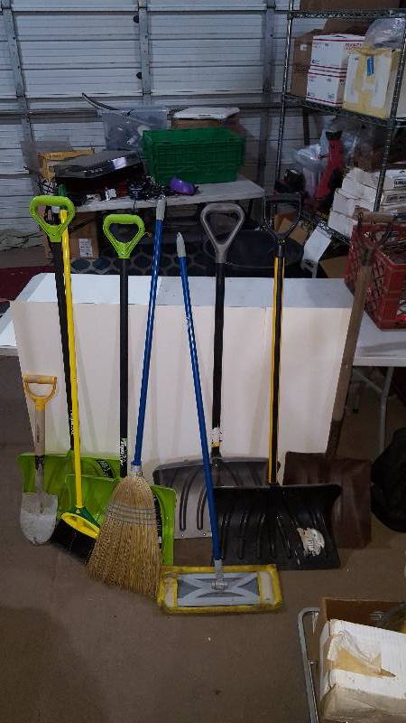 Lot of brooms and Shovels