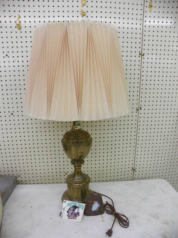 Lamp, Sioux window decal and old cow bell