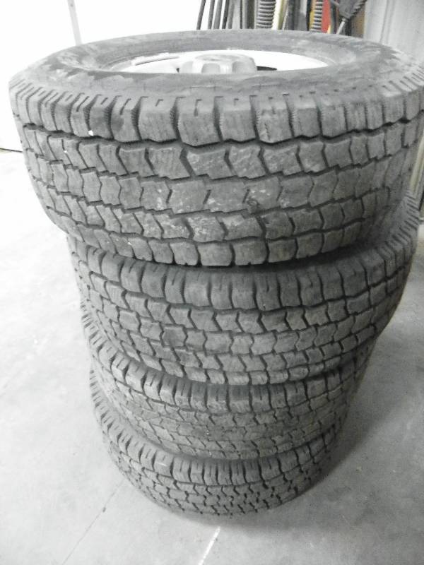 lot 114 image: CHEVY 8-HOLE WHEELS AND TIRES