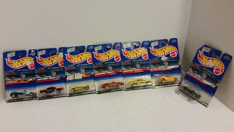 lot 19 image: WOW Lot of (7) Hot Wheels Cars - Rare Tony Hawk One included See Pictures and Description for Details