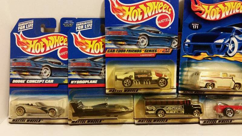lot 27 image: Lot of (9) Hot Wheels Cars in Original Faded Packaging - See Pictures - Great Starting Price
