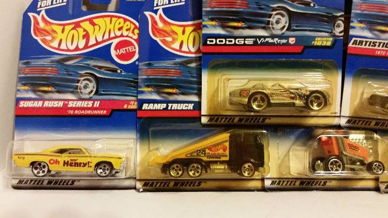lot 28 image: Lot of (9) Hot Wheels Cars In Original Packaging (Faded) - See Pictures and Description for Lot info
