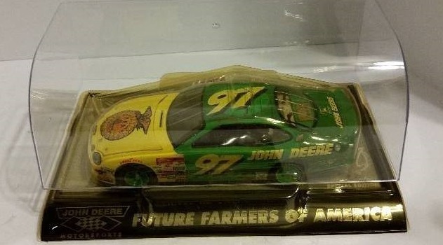 lot 6 image: Racing Champions 124th Scale NASCARJohn Deere MotorsportsFFA #97 Chad Little Ford Taurus with Decorative Display Case