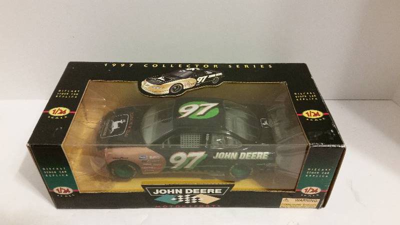 lot 8 image: Racing Champions 1997 John Deere Motorsports 124th Scale #97 Chad Little Ford Taurus Diecast Metal Car Serial Number 00266