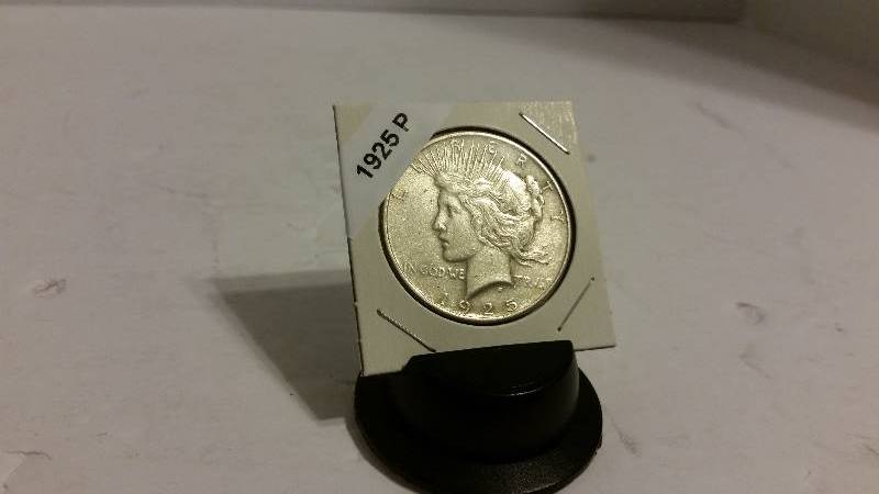 lot 97 image: 1925 P (Philadelphia Mint) Silver Peace Dollar - 90% Silver 10% Copper Carded - See Photos
