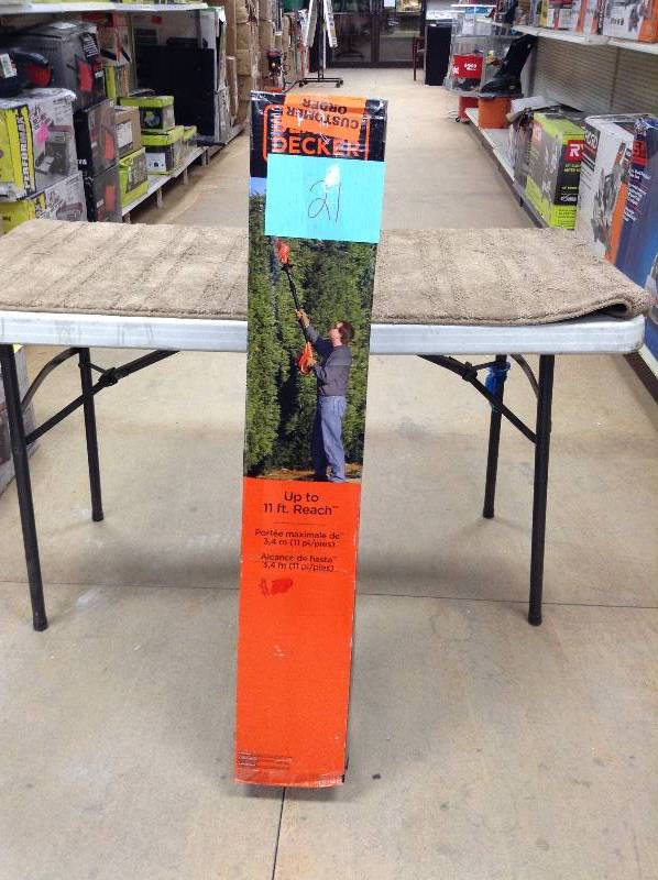lot 21 image: Black & Decker LPHT120 18-Inch 20-Volt Lithium-Ion Cordless Pole Hedge Trimmer Tool Only not used