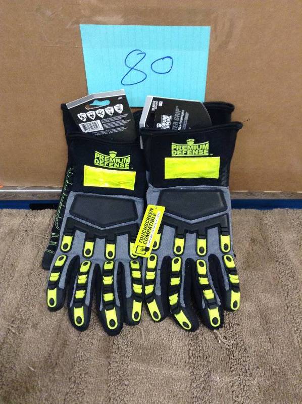 lot 80 image: Lot of 2 New Premium Defense gloves