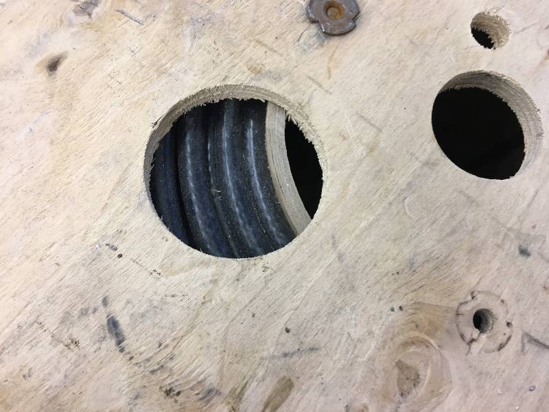 lot 13 image: 100ft roll of cable looks to be half gone