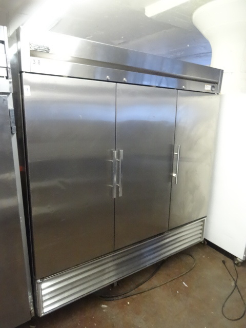 lot 9 image: True 3 door freezer. T-7tF. On whee...