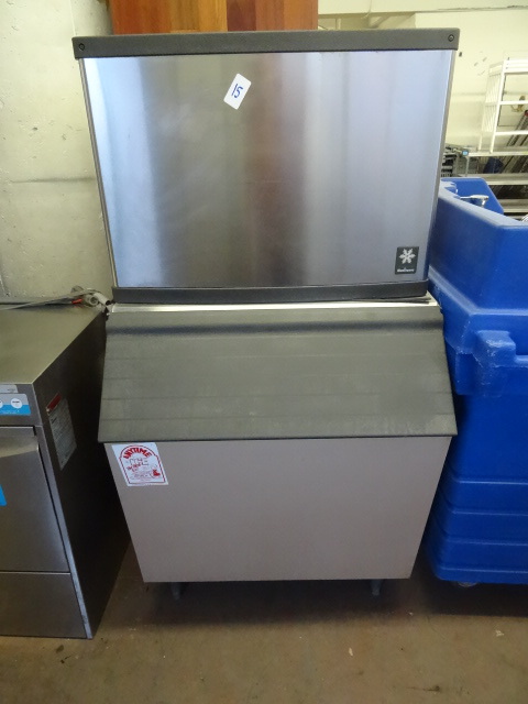 lot 15 image: Manitowoc ice maker with bin. Model...