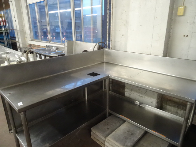 lot 54 image: L shaped prep table with back splas...
