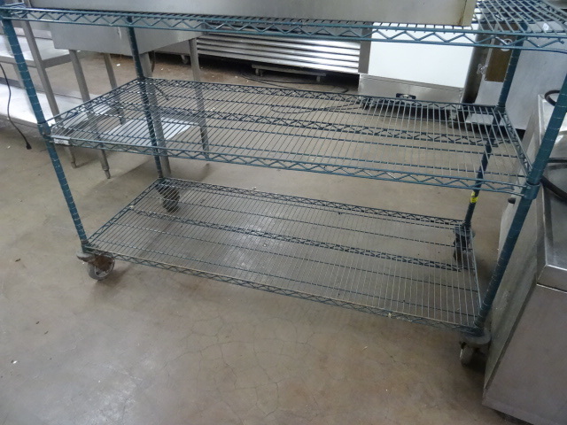 lot 60 image: 3 tier wire rack on wheels. Inter m...