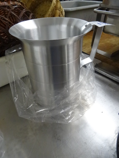 lot 134 image: New aluminum measuring pitcher. 4 Q...