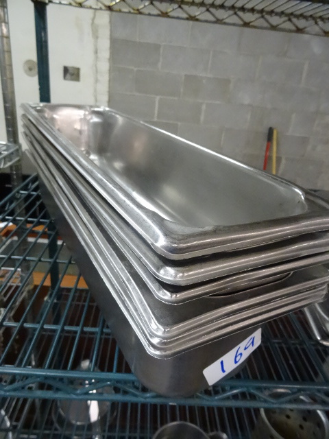 lot 169 image: 12 size pans...